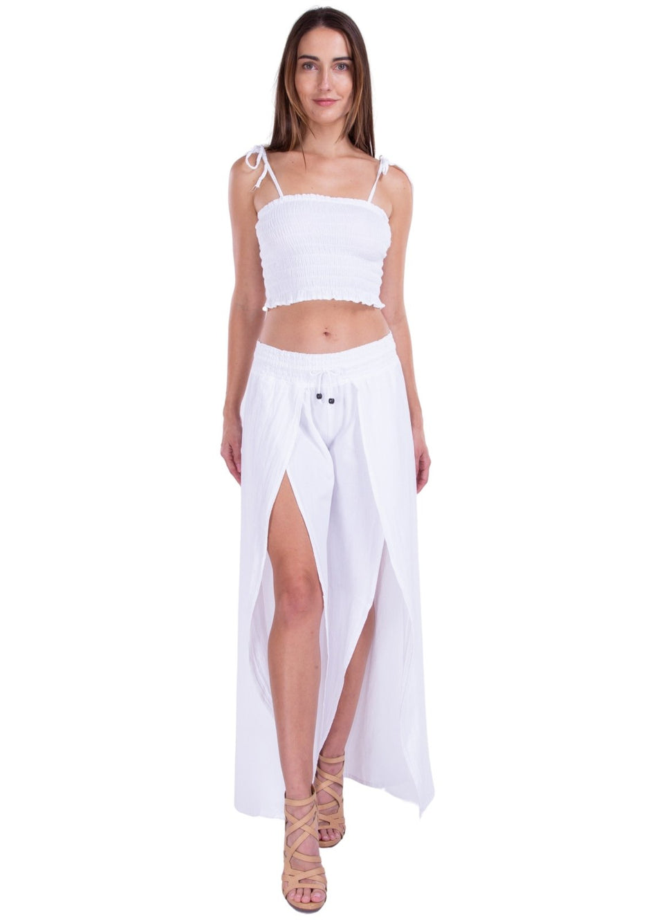 https://seaspiceresortwear.com/cdn/shop/products/mia-shirred-tube-top-white-690466_950x.jpg?v=1690484245